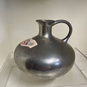 Vintage Bols 100 Proof pewter jug with handle and spout.